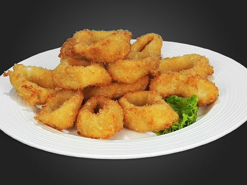 Кальмар кольцами в сухарях жареный