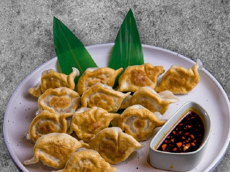 Пельмени жареные со свининой