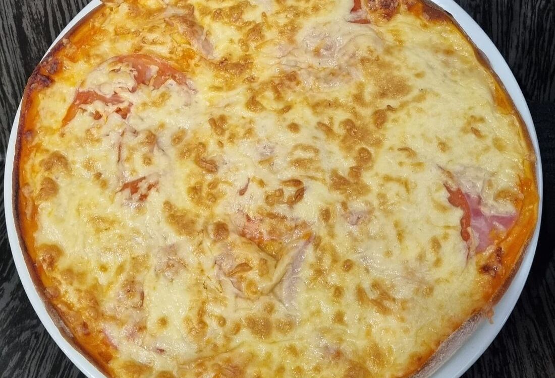 С ветчиной и ананасами